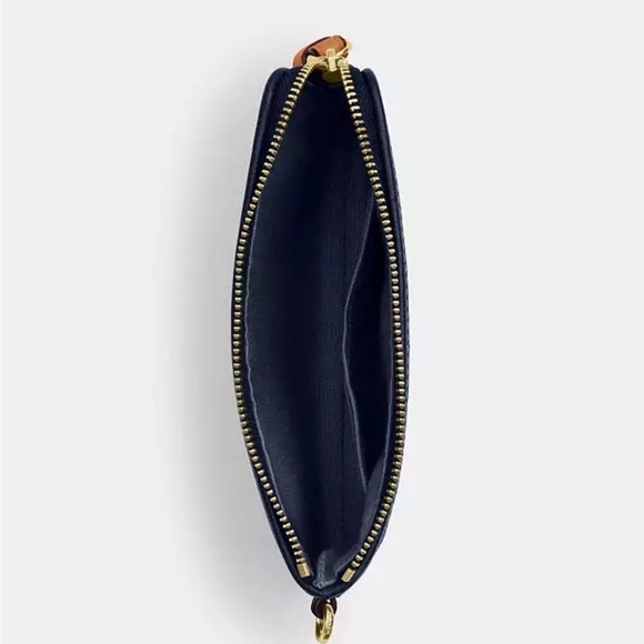 Coach Corner Zip Wristlet In Signature Denim
